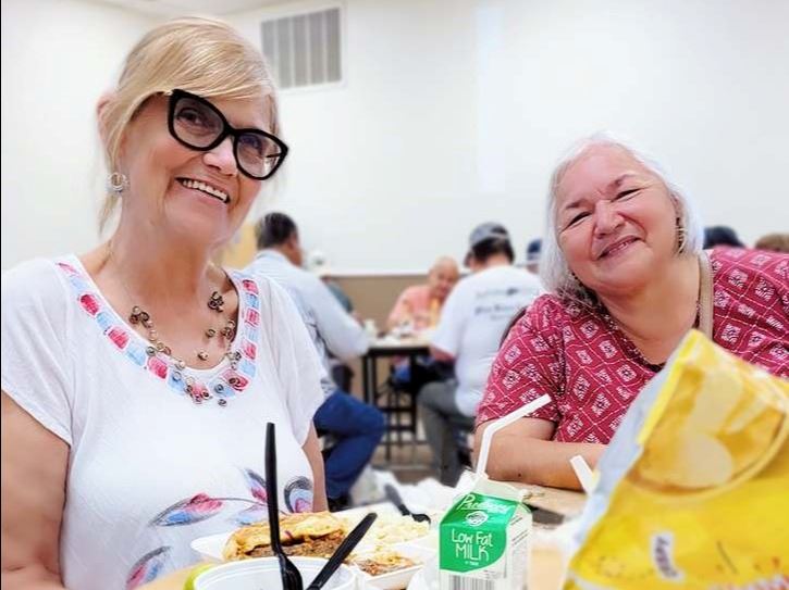 Seniors having lunch at the Senior Nutrition Program