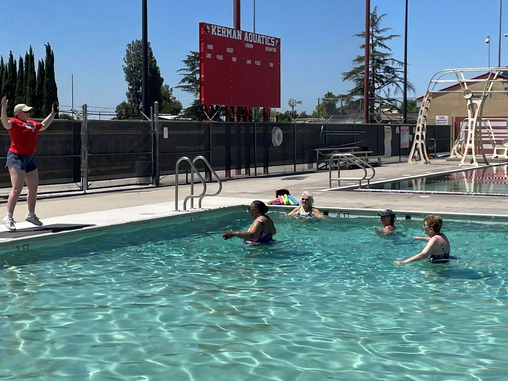 People in the Pool during a water aerobics class